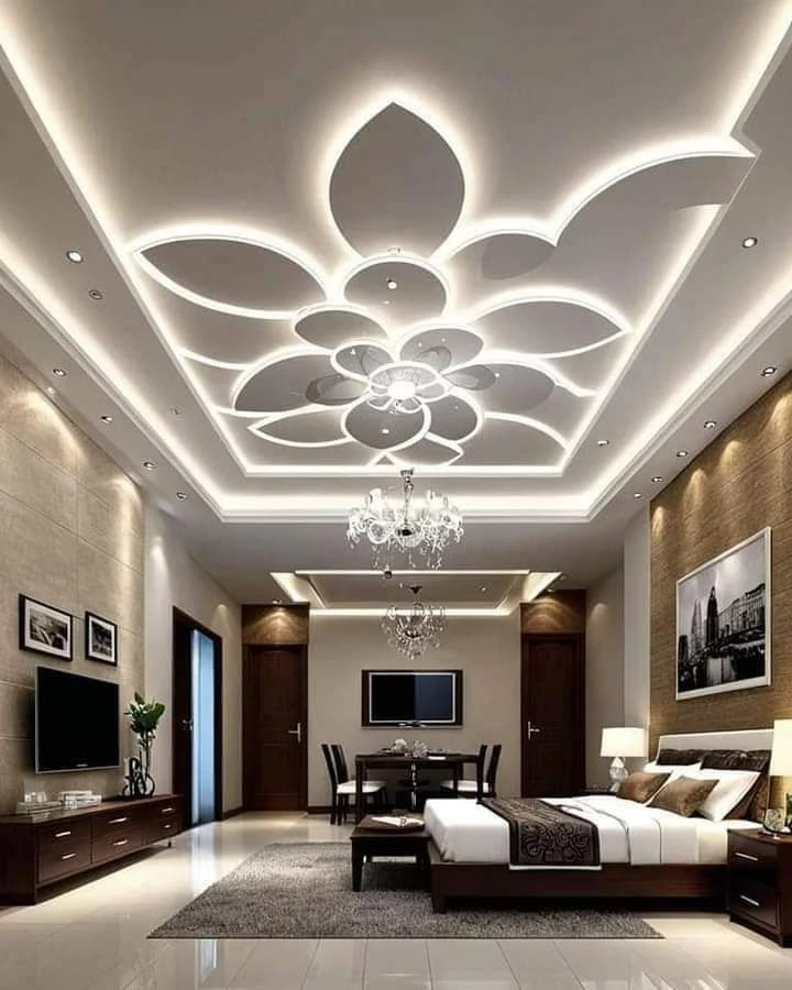 سقف جبسي بتصميم هندسي داخل غرفة نوم